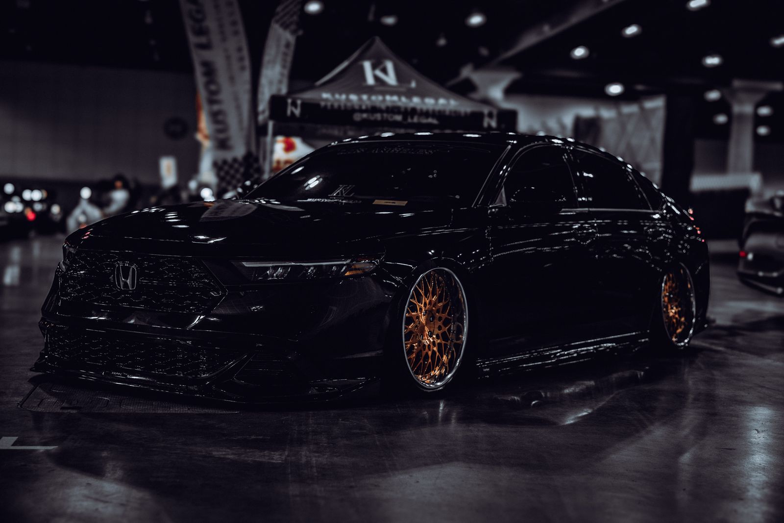 Black Nissan GT-R on bronze wheels