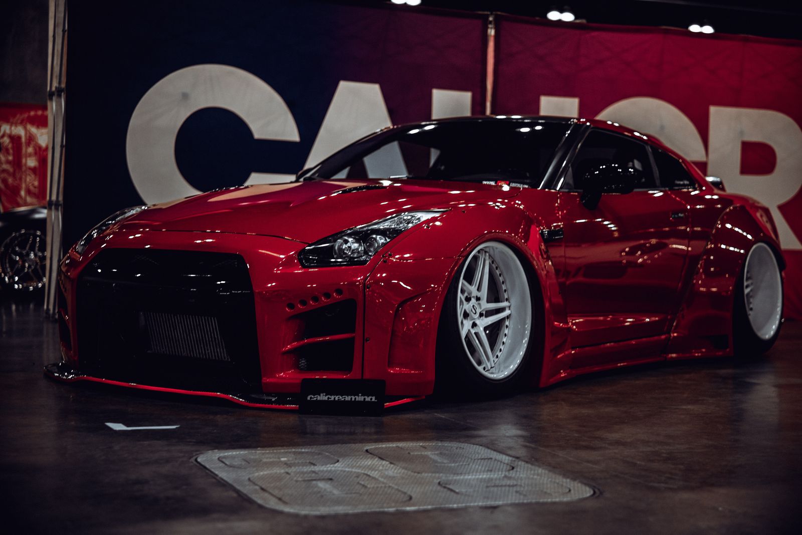 Red Nissan GT-R on the show floor