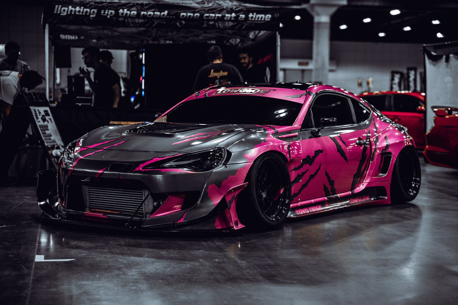 Pink widebody sports car