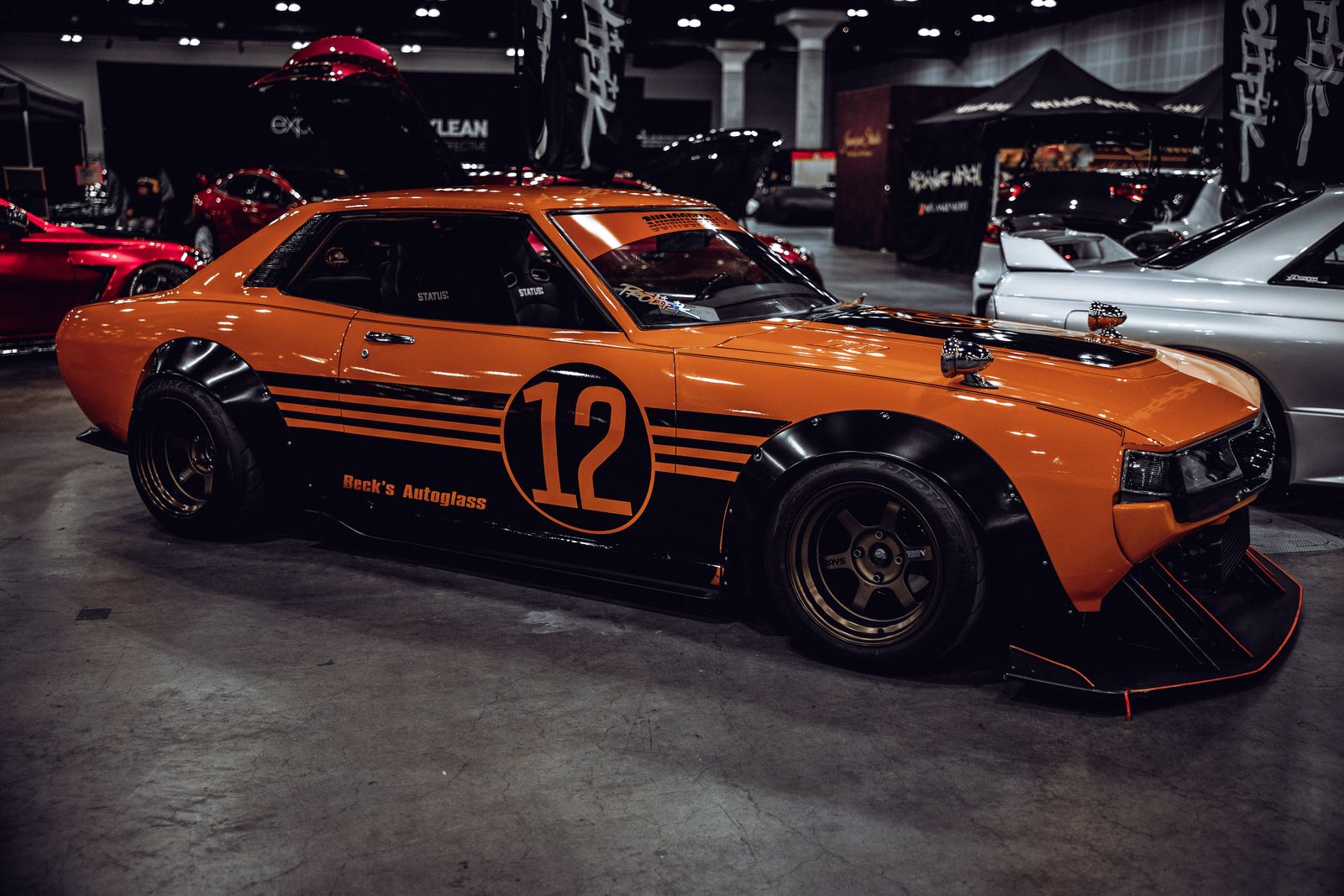 Orange track-spec coupe number 12